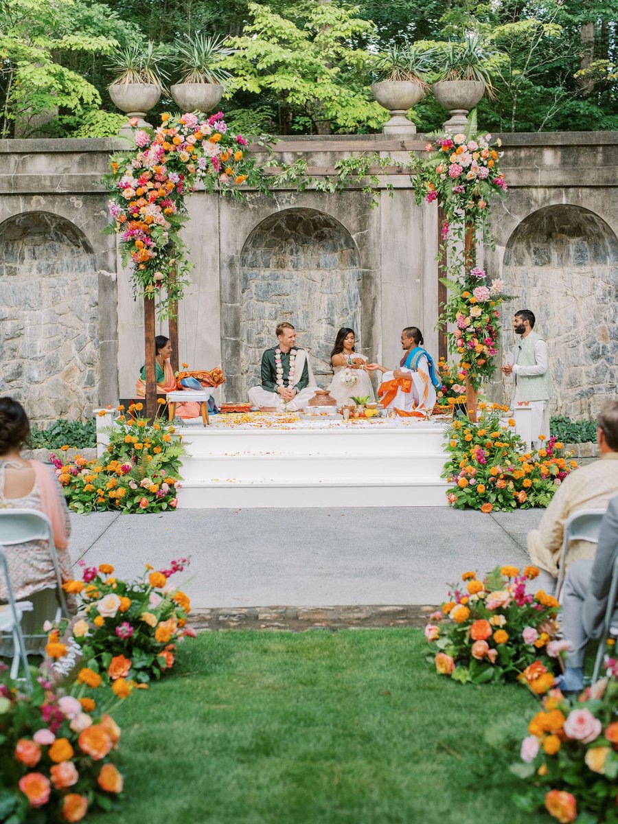 Bright, stunning florals made for a joyous day for R + C! Our team is proud to have executed the floral design &amp; catering, this day was a dream - as seen in a recent <a href="/brides/">BRIDES</a>  article, link below to check it out! #BoldEventsATL 

brides.com/a-hindu-atlant…