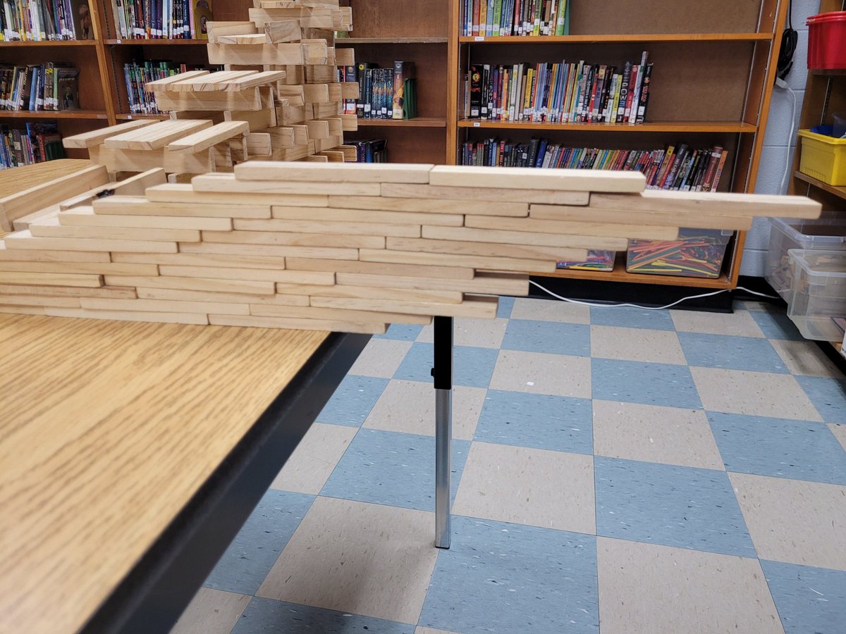 ChuckStoffle's tweet photo. How far can you stretch a Keva build off the table? https://t.co/4TgnFKyifX