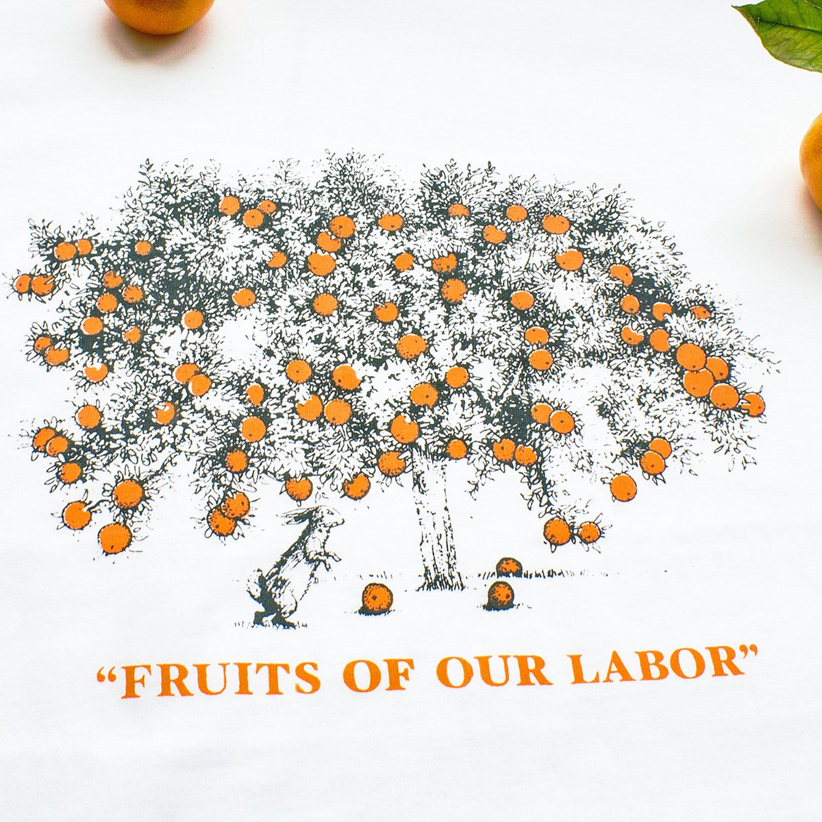 🐰FRUITS OF OUR LABOR🍊 
A collaboration with Tangerine Corp

Item 1/3 - ‘Family Tree’ Tee 
Orange ink contains an additive making it tangerine blossom scented