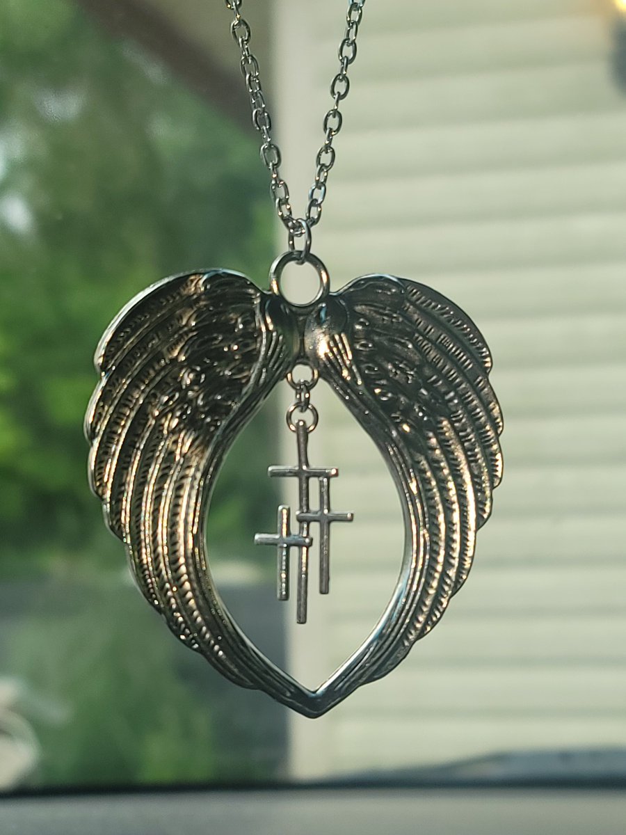 American4Truth's tweet photo. My new rear-view mirror adornment.🥰✝️
It's the three crosses of Calvary, shielded by the powerful wings of one of Heaven's mightiest guards.❤️🙏 https://t.co/ZnVRjgSatc