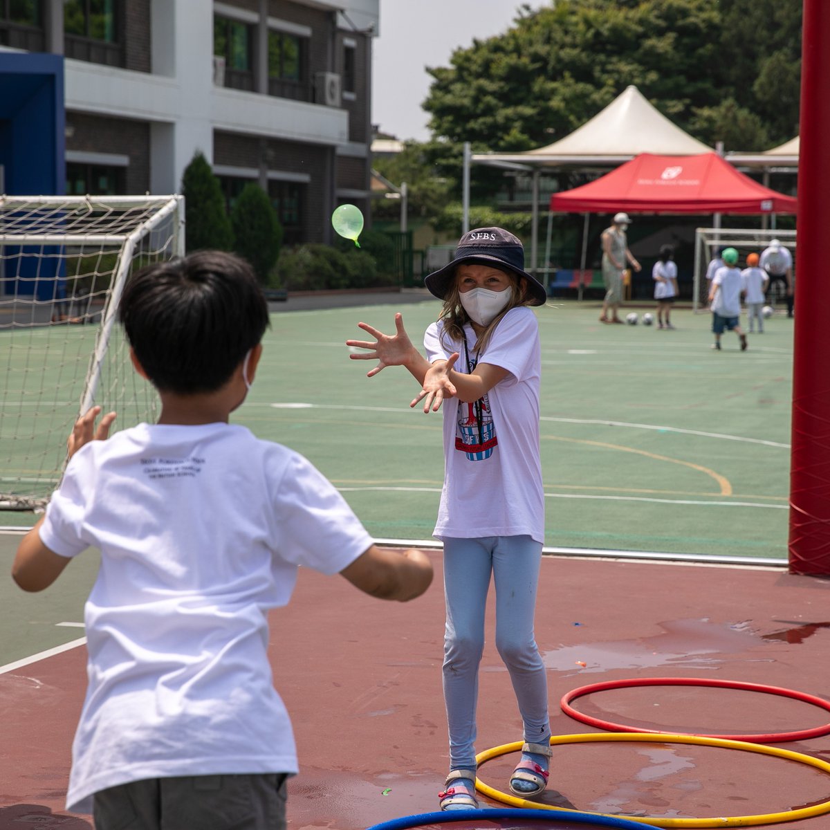SFS1912's tweet photo. A very happy 40th birthday to the @SFBritishSchool! Special celebrations included a commemorative student-designed t-shirt, a flag parade representing the many different cultures within the British School community, and fun fair activities for students and faculty. #sfs1912 https://t.co/V77WwCtrBL