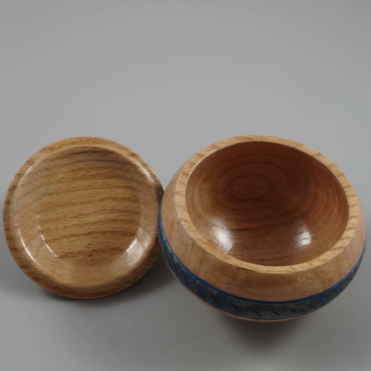I came across a few bowls with lids that I roughed out a few years ago &amp; forgot about. This is the first one. I mucked about a bit with the Sorby texturing tool, some India ink and blue acrylic paint. There's room for improvement but fortunately I have a few more to practice on.