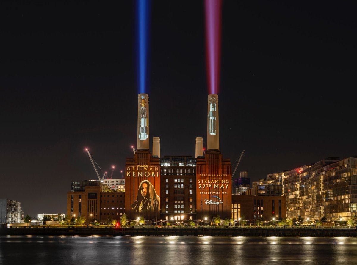 sw_holocron's tweet photo. Obi-Wan Kenobi and Darth Vader’s lightsabers light up the iconic chimney stacks of Battersea Power Station #ObiWan https://t.co/u20xnU6RzM