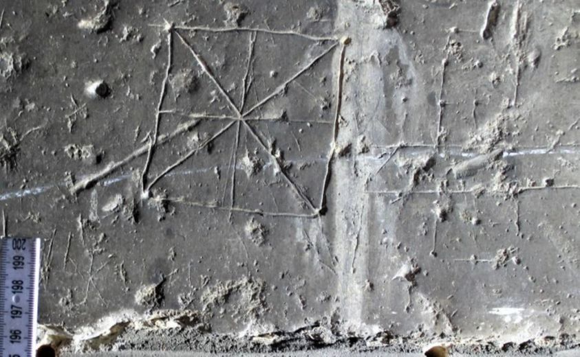 Volunteers photographed &amp; documented over 724 different examples of historic graffiti on both floors of the building.
This is a wall-carved game board.
On the left is a small ‘merels’ board, a 3-Mens-Morris.
On the nearside is an eroding gameboard graffiti known as Fox &amp; Geese!