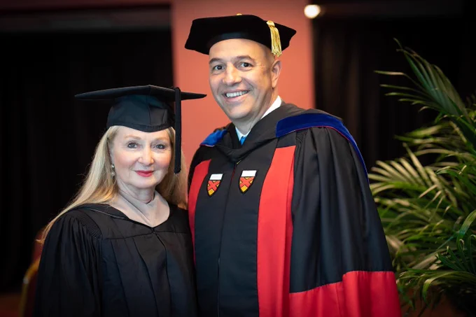 Photo of Dean Alexander Triantis and keynote speaker Andrea Weiss.