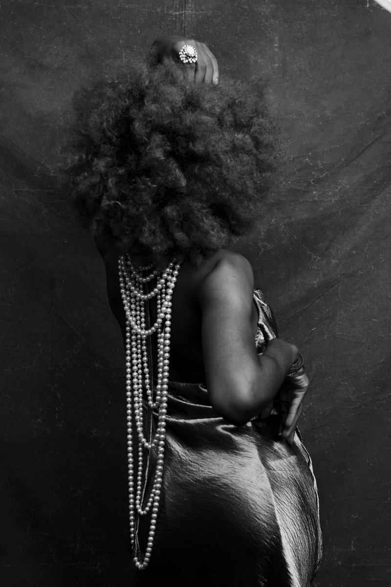 A Portrait of A Lady and Her Pearls.