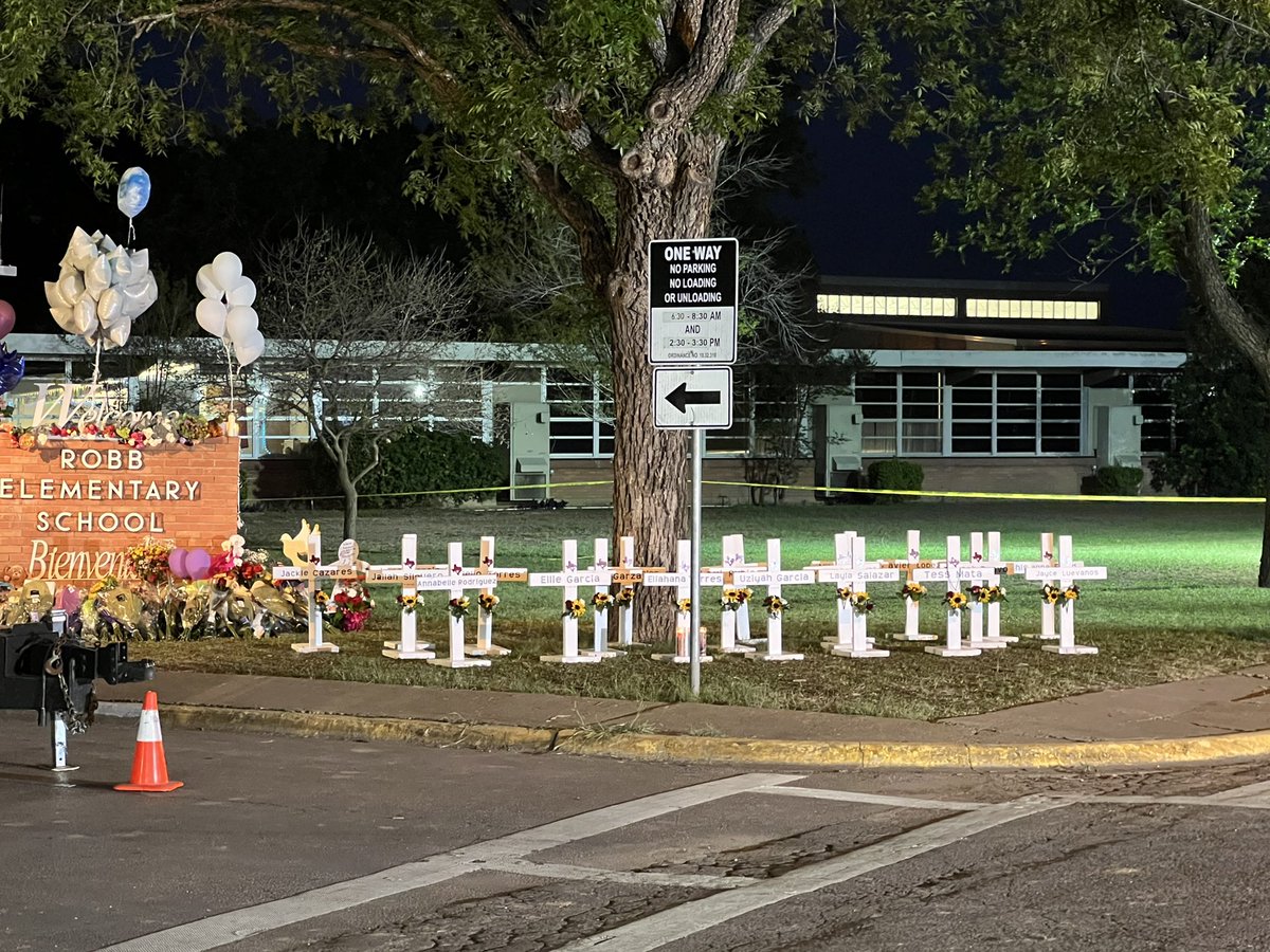 21 crosses outside Robb Elementary School this morning for the 19 fourth graders and 2 teachers murdered.