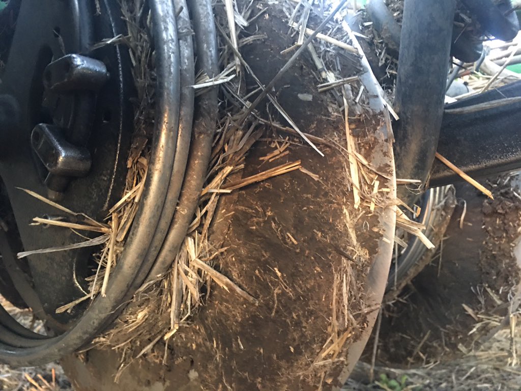 RodPohlner's tweet image. That $3 hose clamp stoped me getting out of the cab every 10mins to clean baked on mud off between the gauge wheel and the disc Usually I can run the wheel close or wide &amp;amp; one will work, when neither did the clamp stoped the build up but it did throw more mud so I made a mud flap