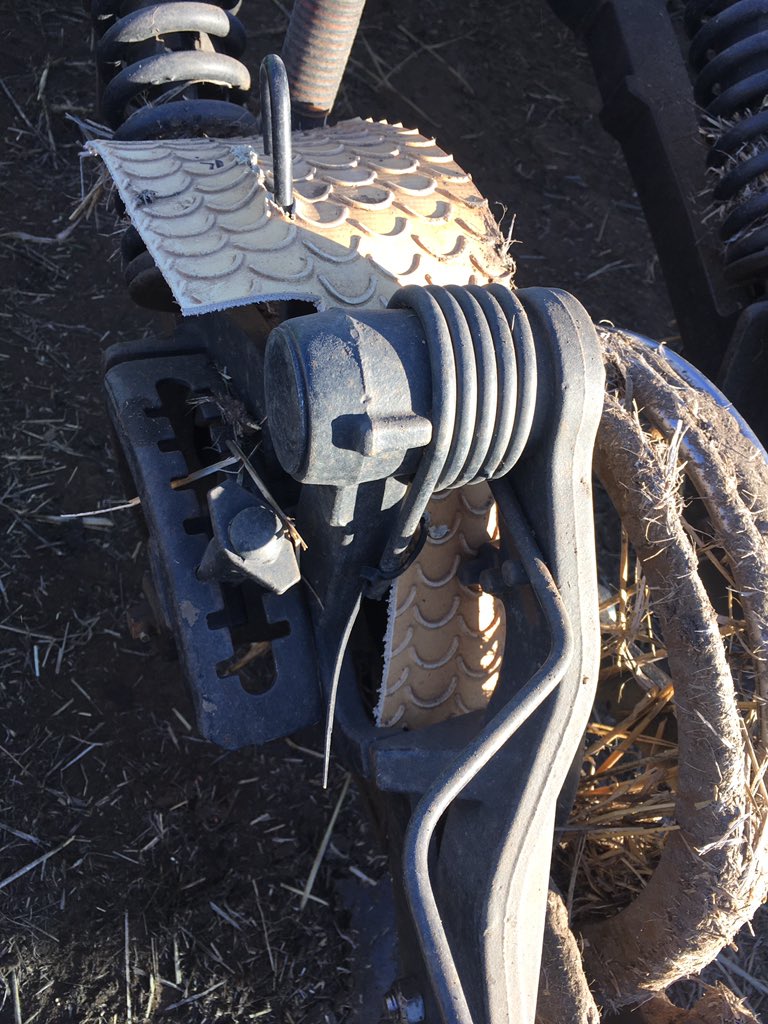 RodPohlner's tweet image. That $3 hose clamp stoped me getting out of the cab every 10mins to clean baked on mud off between the gauge wheel and the disc Usually I can run the wheel close or wide &amp;amp; one will work, when neither did the clamp stoped the build up but it did throw more mud so I made a mud flap
