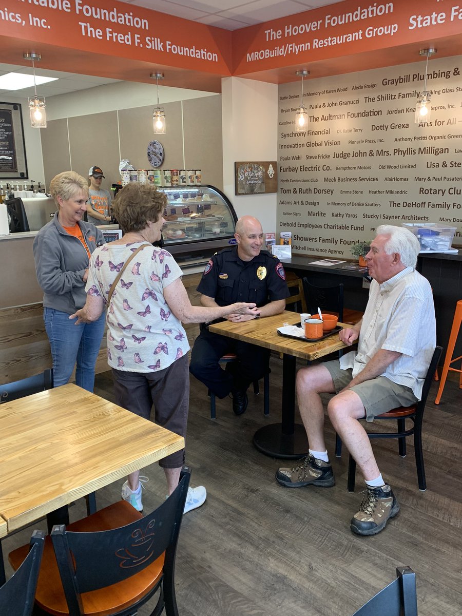 NorthCantonPD's tweet photo. Coffee with a Cop is underway, come on out and chat with Chief Kemp and Sgt. Buzzard at Whole Latte Love Cafe https://t.co/VWII5w9f2O