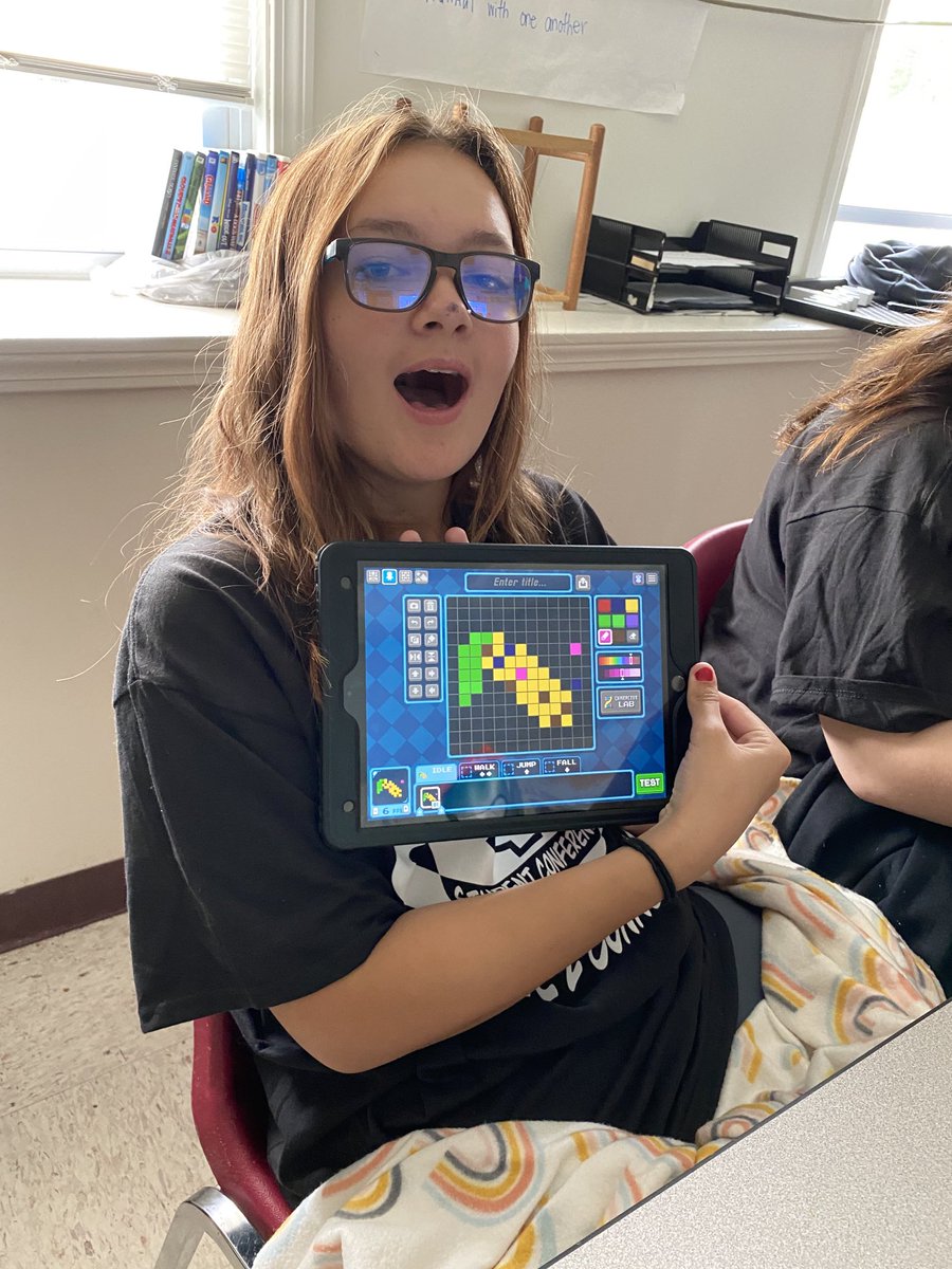 MainelyJenny's tweet photo. #MLTI22 Jenna says her banana’s way better than Jonathan Graham’s banana!!! They’re having a blast wi Bloxels!!! https://t.co/GSN0gnXVW4