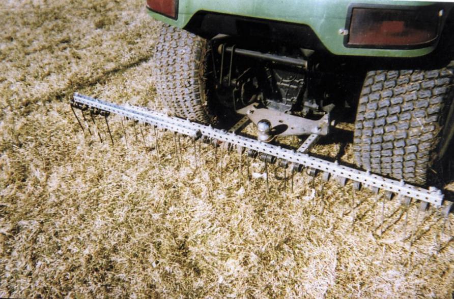 FarmShow's tweet photo. Bob Wenzel made a dethatcher for the back of his Deere riding mower by mounting a series of baler teeth on a 4-ft. length of 1-in. sq. tubing, which bolts onto the mower's hitch plate. #dethatcher #dethatch #lawnmower #ThrowbackThursday https://t.co/AOYJqBZbQZ https://t.co/8Cdw2q2Wt1