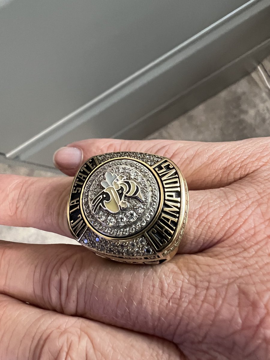 Hanging some new pictures in my office today! Plus we got our State Championship rings! #statechamps #28-0