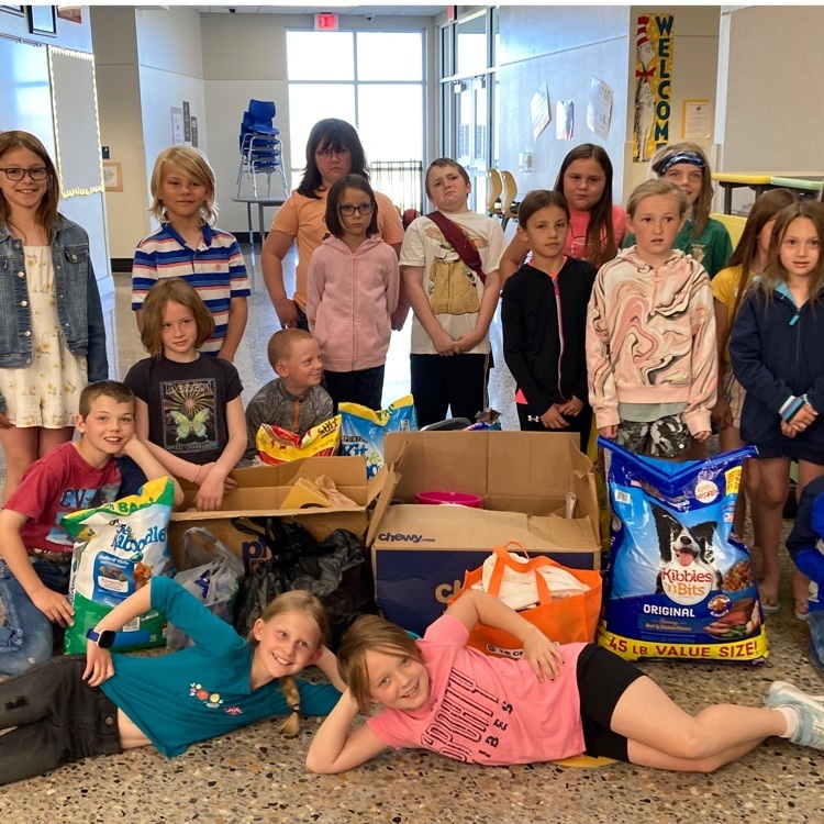 Third Graders collected donations for the Paws for Life animal shelter as their community service project