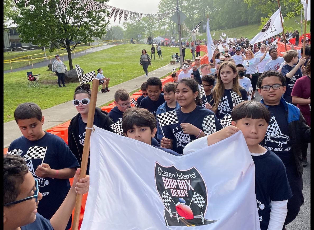 Ps6931R's tweet photo. On Saturday, 5/21, District 31 Staff, Students, Caregivers, came together for Staten Island's Soapbox Derby! A GREAT BIG SHOUTOUT to Ms. Johnson &amp; PS 69's Sopabox Derby Team for giving it their ALL!!! We are so very proud of you! #ps69 #dolphinpride https://t.co/L62PMXvwYo
