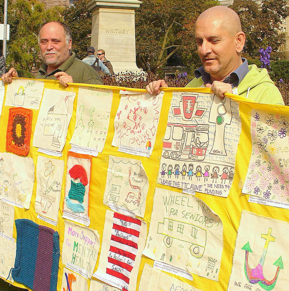 TheDreamTeamTO's tweet photo. #TBT to letting all at #QueensPark see our #SocialSafetyQuilt, which addressed the multiple ways poverty hurts and leaves people undignified. We look forward to letting ourselves be heard again come June 2nd. https://t.co/RfA9xtfhK7