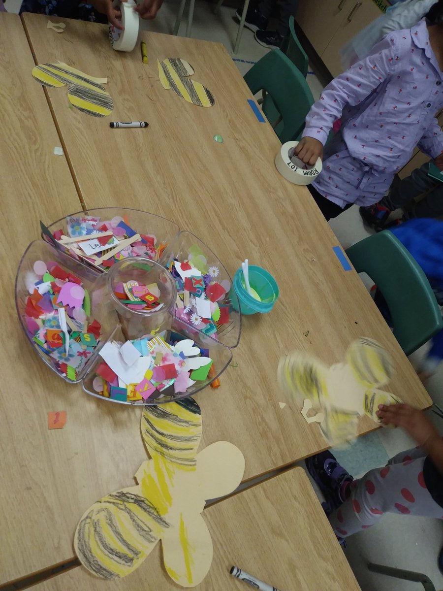 BJGteach92's tweet photo. As our students begged for more butterfly shapes, something wonderful happened. All they saw were bees - after a bee #InquiryMindset these past few wks. They tore off the antenna and did this instead! We almost didn't make it out the door #SwarmOfBees! https://t.co/6tg1zCRpWs
