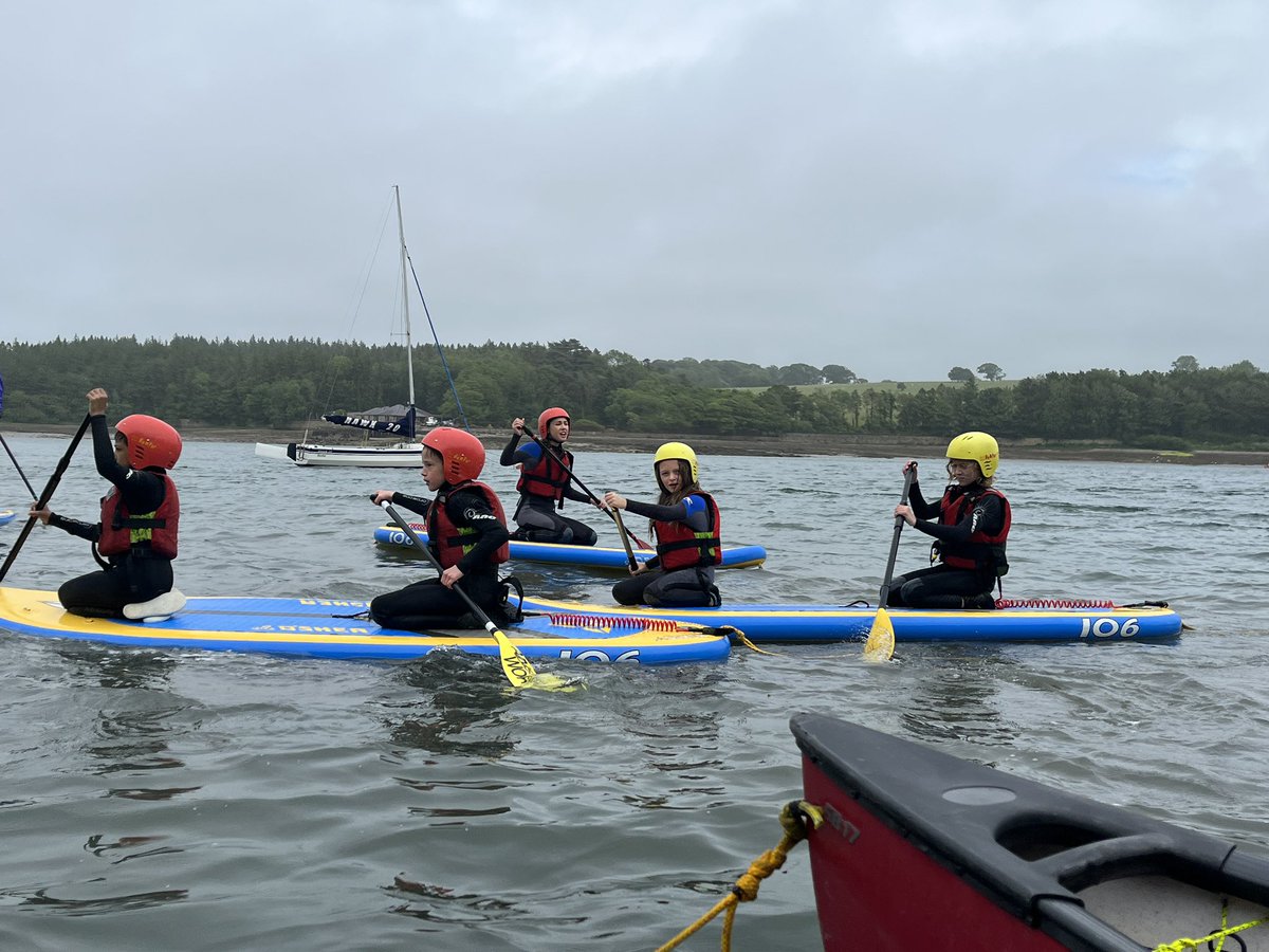 StPhilipsY6B22's tweet photo. Stand up paddle boarding was so much fun! We paddled into the Menai Strait before returning to the harbour. It should be called kneeling paddle boarding, but some of us managed to stand near the end! #teamstphilips #stphilipsy6residential https://t.co/o9kJKzTVji