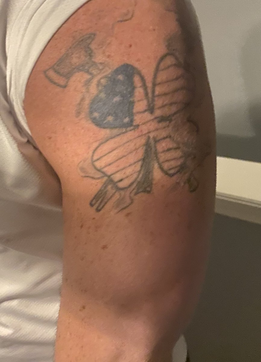 AdultRaver's tweet photo. I need this covered up. 10 year old poorly drawn firefighter tattoo. I’d like an owl and clock design. Examples below. Please sends recommendations https://t.co/b0WjhqTQBX