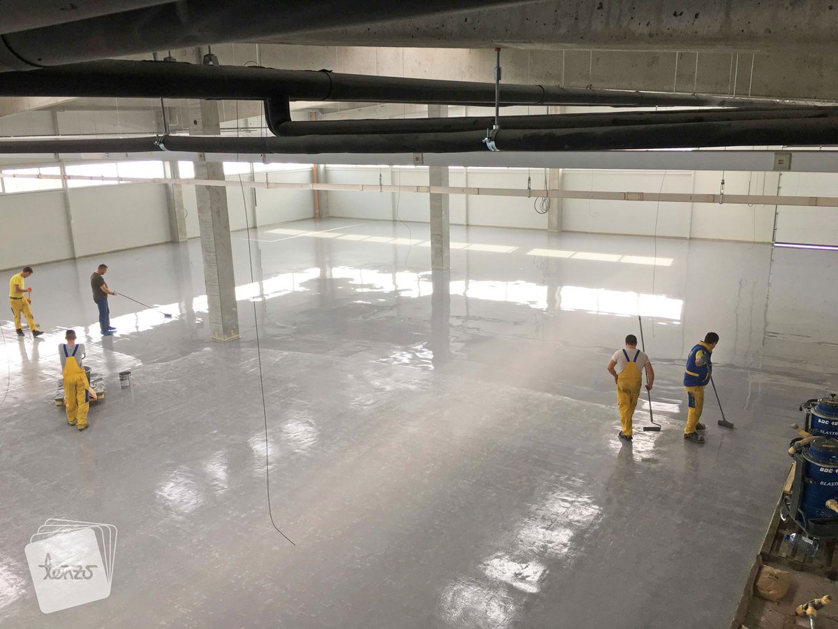 ViacorPolymer's tweet photo. The "Yellows" are at work 😉 A warehouse in Bosnia is coated by TENZO doo Banja Luka. The second layer: self-leveling epoxy coating for industrial floors.

#warehouse #flooring #material #epoxy #resin #coatings #viacor #work https://t.co/EVBgnlaAnK