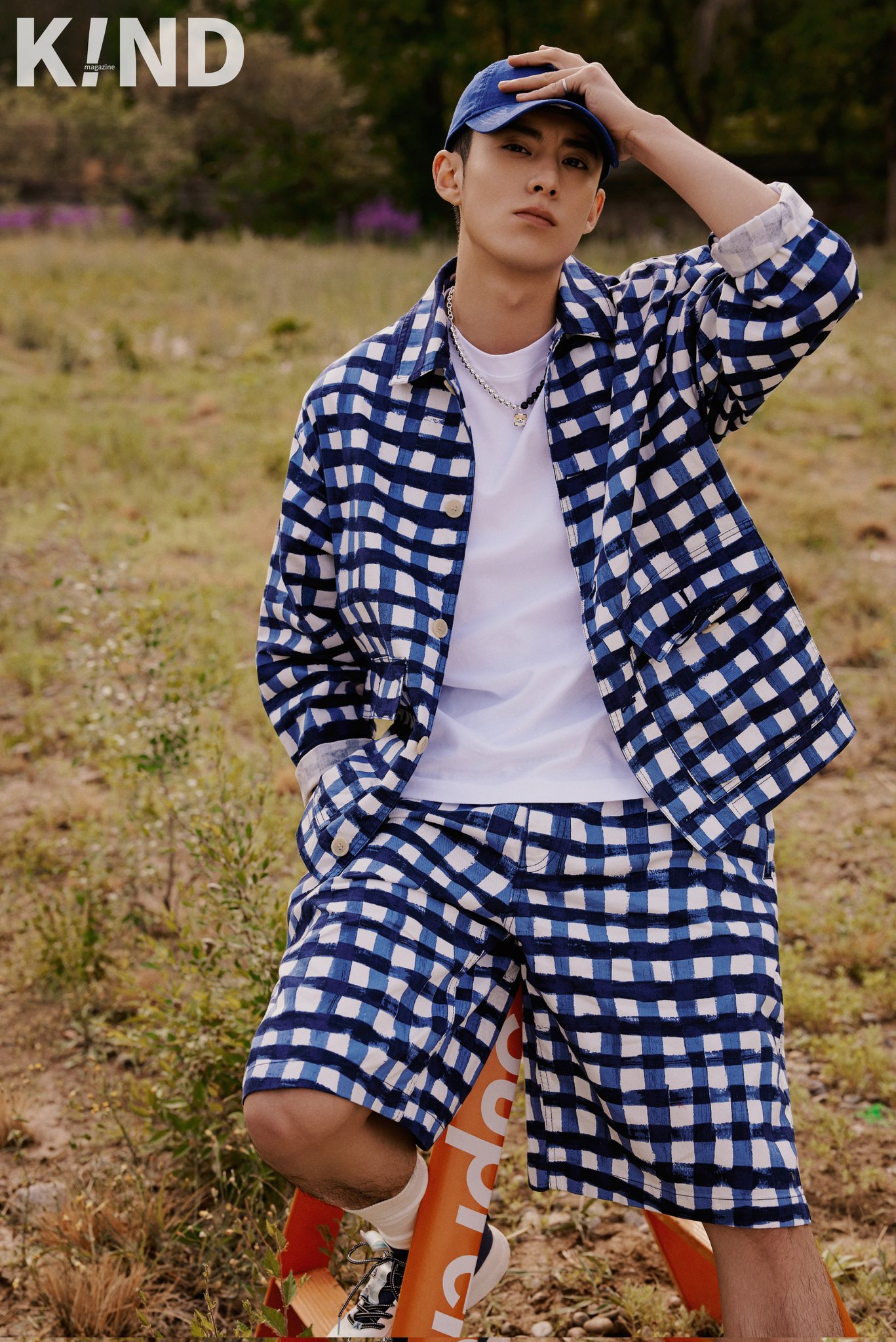 Download Dylan Wang Wearing Checkered Polo Wallpaper