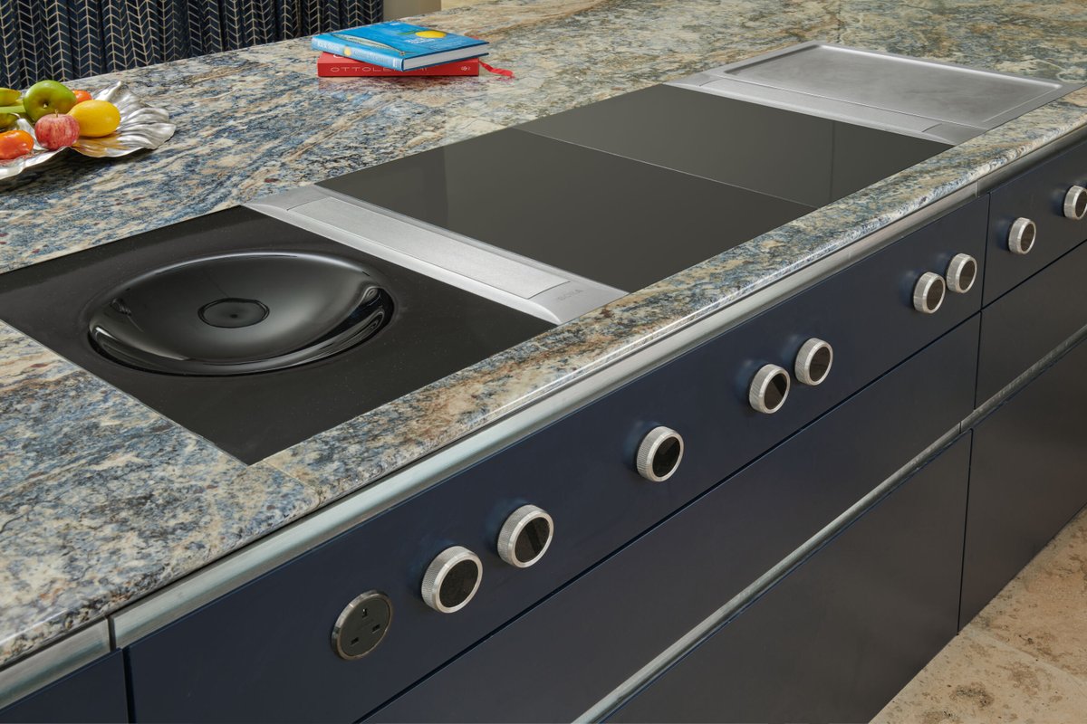 How amazing would it be to have a cooking setup like this! Commission us to design, hand-craft and install your dream #kitchen and you can rest assured we'll include all the features you want— such as an induction wok built into your #kitchenisland! bryanturnerkitchens.com