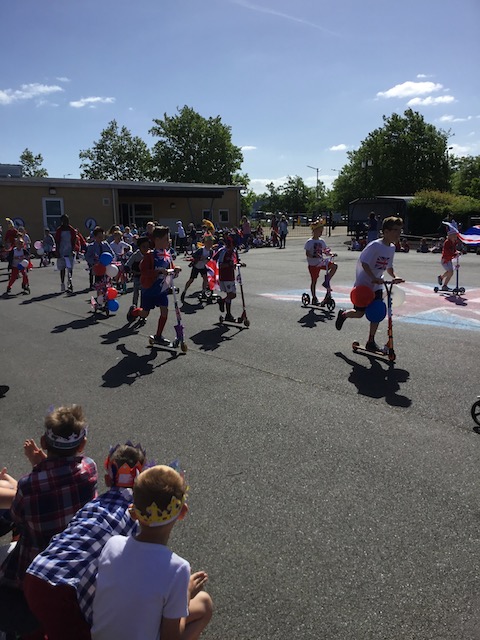 Glorious sunshine and a lovely parade of bikes, scooters and crowns.  We also have a Union Jack flying from the flagpole for the day.