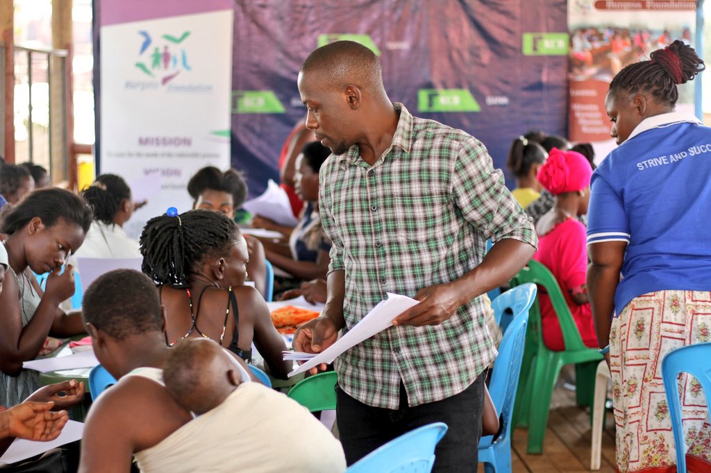 burgess_fdtn's tweet photo. Happening Now; Mr.Ssetimba Mose engages young mothers in kinawataka how to arrange pages of a black book on this #BeHandsOn skill workshop https://t.co/MWxwFdkzjw