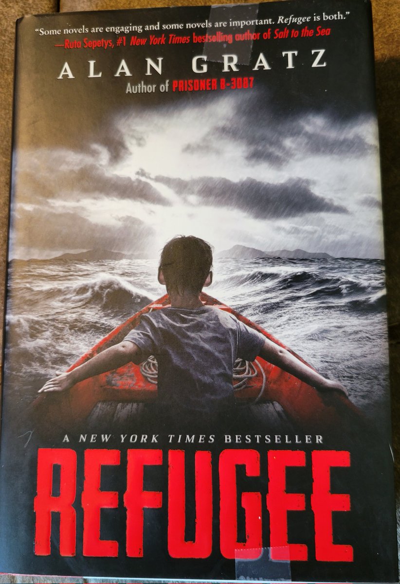 kristenwilton's tweet photo. Book 19 of 2022: "Refuge" by @alangratz, a favorite author of my @srchuskies! I can see why when I read his books. Such a great way to teach history and empathy through reading! I have several more on my #tbr pile. Highly recommend! #IreadYA #BookLover #booksofsummer #rollskies https://t.co/lqWIQvVfA5