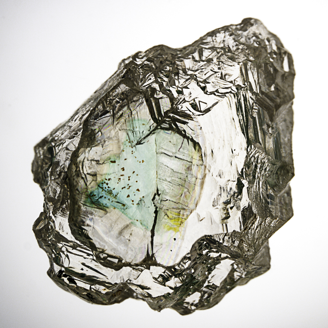 GIAnews's tweet photo. Natural green diamonds are colored by exposure to radiation in the earth. This radiation does not always penetrate evenly, as seen in this 2.02 carat green diamond crystal. This crystal must be cut strategically to maximize its size and color. Learn more: https://t.co/c8xHDsEpM7 https://t.co/O4I8MWGcbC