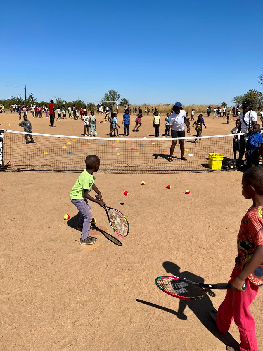 stanleystravels's tweet photo. How it started, and how it's going. Two photos from 2008, when OTLC school in Ngwenya, Zambia had 10 students and a grass hut. And two photos from 2022 #with 400 students and a big sports day with tennis lessons. OTLC has come a long way, baby! #ngwenya #zambia #education #otlc https://t.co/W8OiGNnrwf