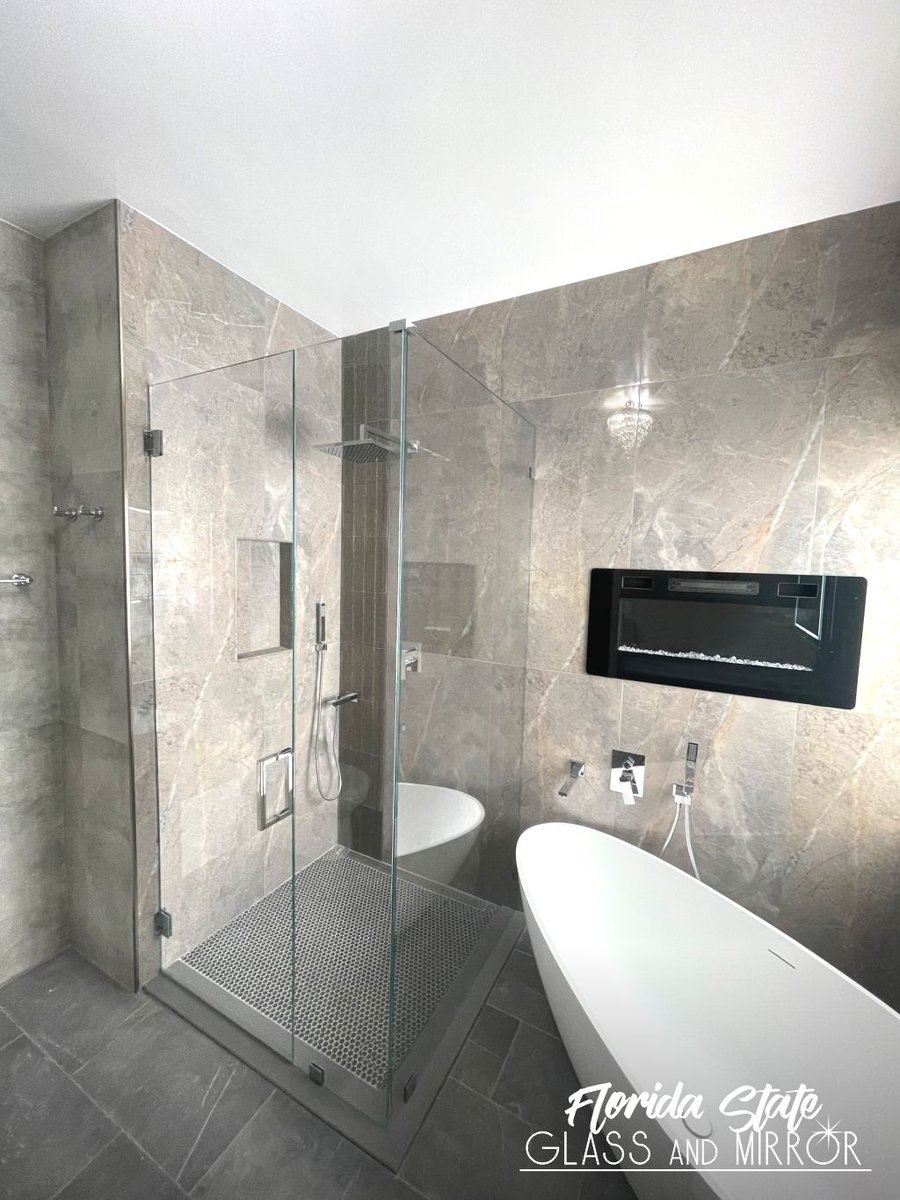 Add a sleek touch to your bathroom with our Frameless Shower Door. Call Us for a Free Estimate at 561-997-6990 #framelessshower #framelessshowerdoor #framelessglass #shower #showers #showerdoors #showerenclosure #glassdoors #glassandmirrorexperts #glassexperts #floridastateglass