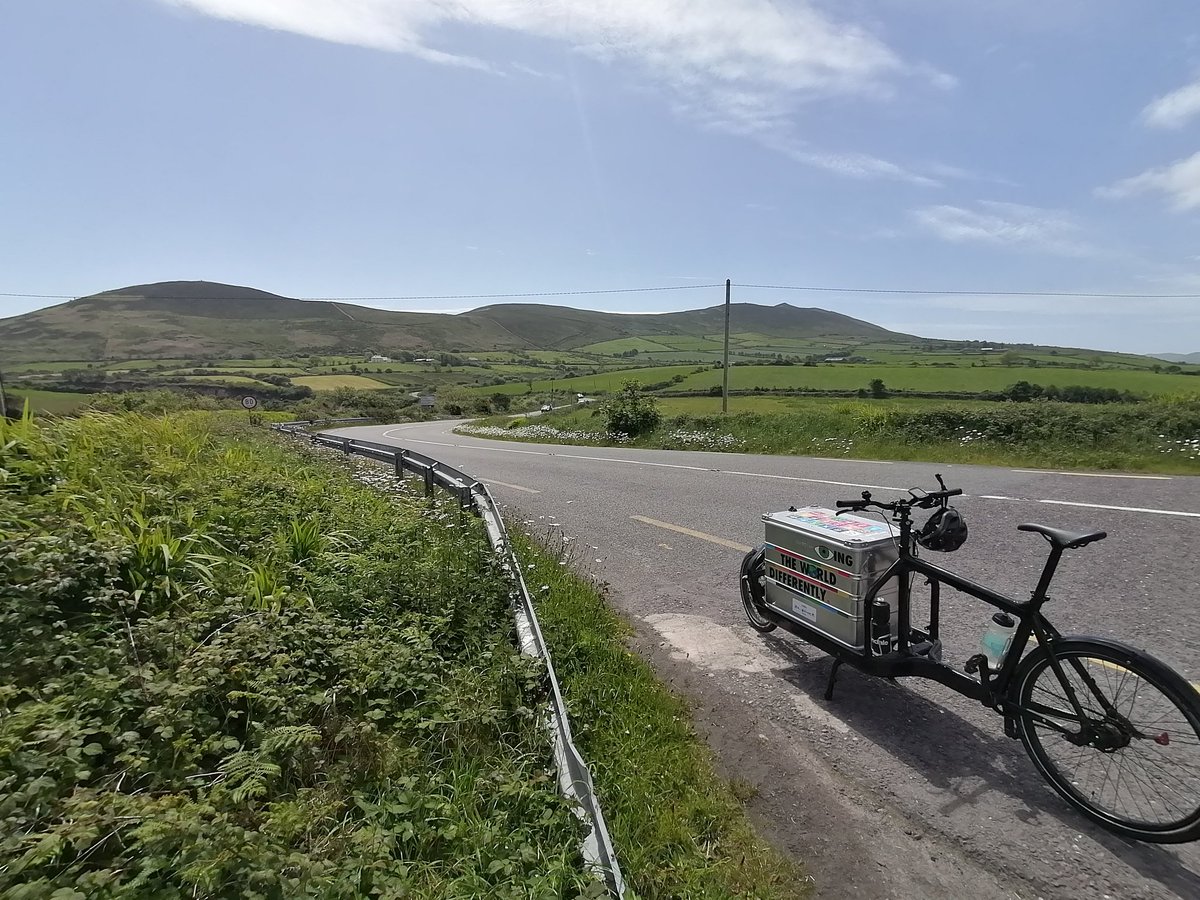 Some difference between yesterday and today as @NickJDoran is just passing #Anascaul in #Kerry on his way to Killarney on the #SDGRoadshow2022 . #SDGs #GCE