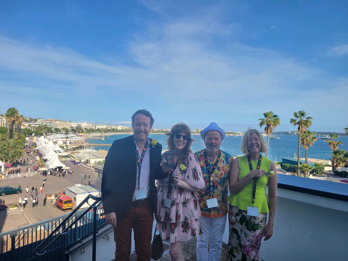 AmDreamTheShort's tweet photo. Sadly, Director Angela Garcia Combs - @Combsherhair  tested positive for COVID before our screenings and had to quarantine for the entire festival. We face-timed her into the panel after the screening on Monday and here for a group photo in the Palais. https://t.co/ifzz9pxSJB