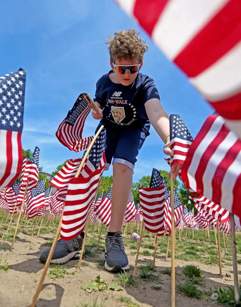 Great photo in the <a href="/bostonherald/">Boston Herald</a> of 10-yr-old Franklin Mitchell planting flags at the Memorial Day Flag Garden on Boston Common honoring the more than 37,000 fallen soldiers who gave their lives in service to our nation. Wishing everybody a happy and safe #MemorialDay2022.