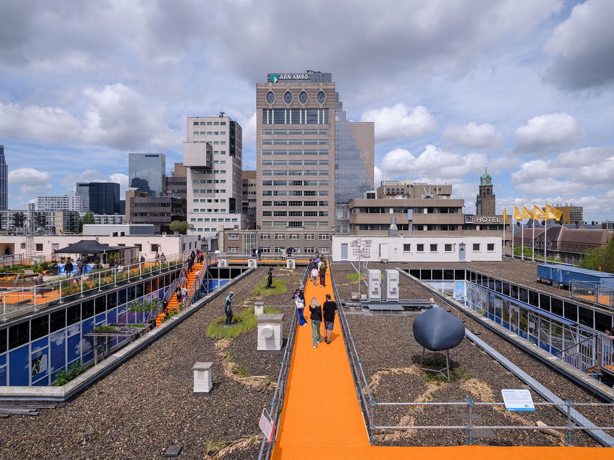 tleedesign's tweet photo. Orange is still the new black: MVRDV's vibrant new Rotterdam Rooftop Walk is officially open. See the first photos here. #architecture #Roofscape https://t.co/0YZHxv7Dhs https://t.co/JDtv9CmjFE