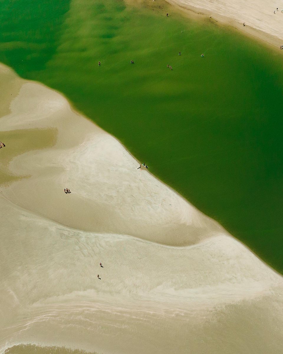 The sandbar off of Sullivan’s Island, along with the surprisingly green and shallow water surrounding it at low tide 
•
#charleston #beach #charlestonsc #sullivansisland #explore #create #travel #nature #photography #drone