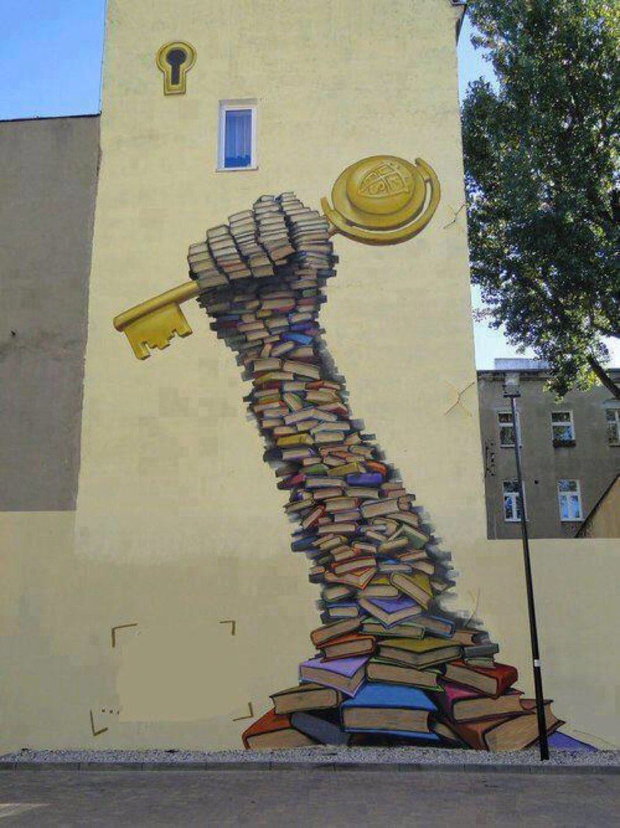 Norveç'te sokak sanatçılarının bir eseri; 'Kitap okumak insanı güçlü kılar.'