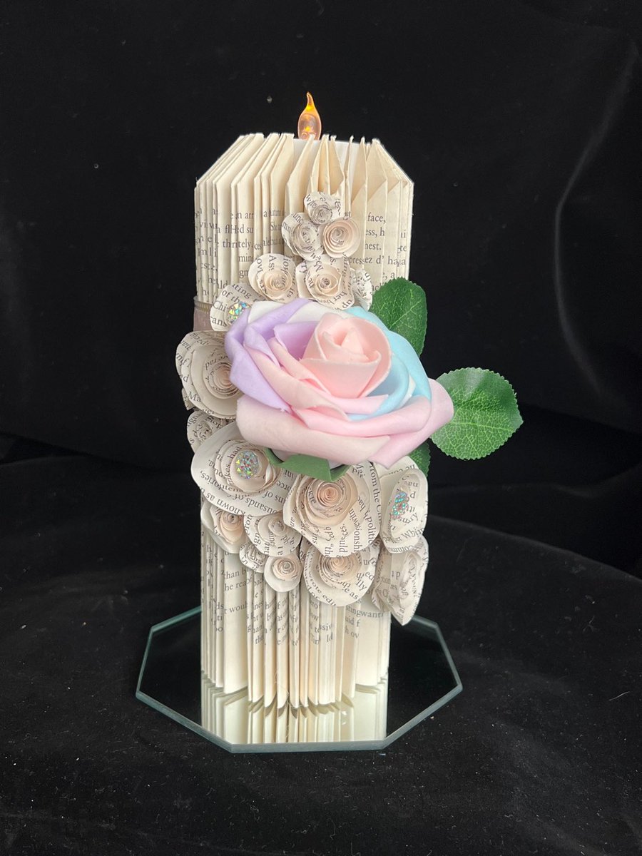 Stunning new #PillarCandle in beautiful  pastel colors. A gorgeous #gift for any occasion! Grab yours at my #etsy shop today! #BookArtSculpture #homedecor #tealight #paperflowers #booklover #books #uniquegift #recycledart #buyitnow #candle  etsy.me/3xFkfdm