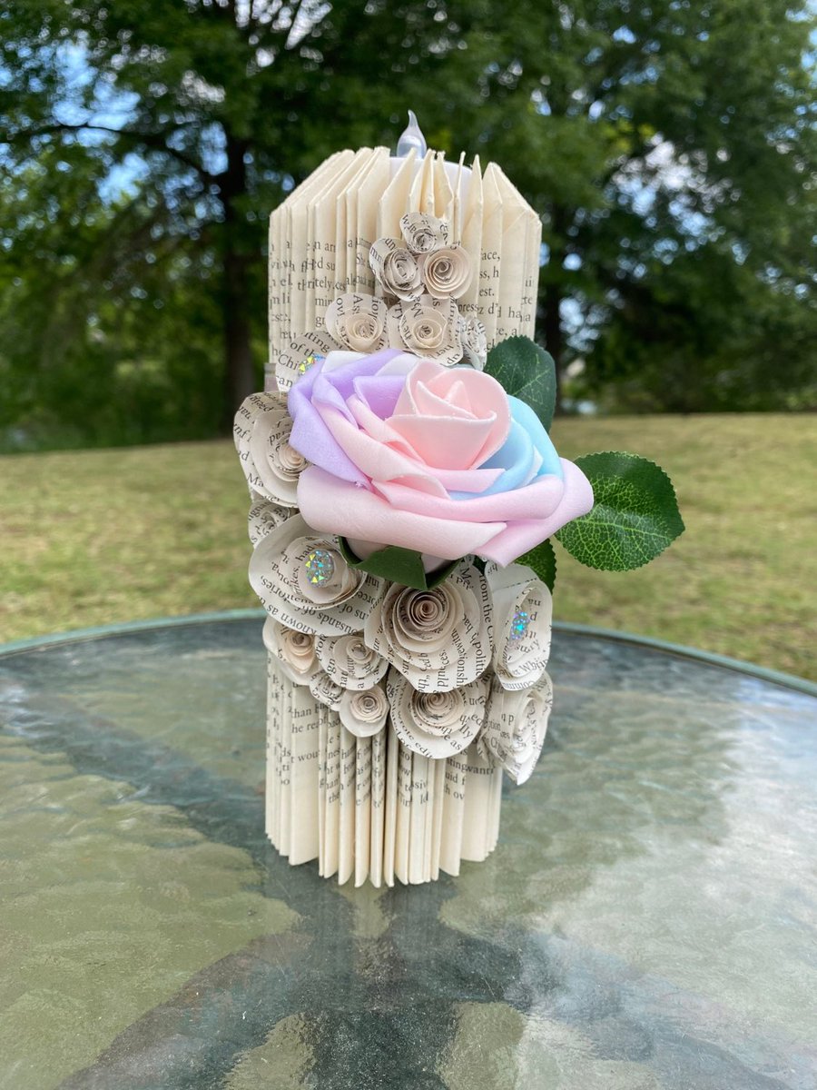 Stunning new #PillarCandle in beautiful  pastel colors. A gorgeous #gift for any occasion! Grab yours at my #etsy shop today! #BookArtSculpture #homedecor #tealight #paperflowers #booklover #books #candle #uniquegift #recycledart #buyitnow #recycledreads etsy.me/3xFkfdm