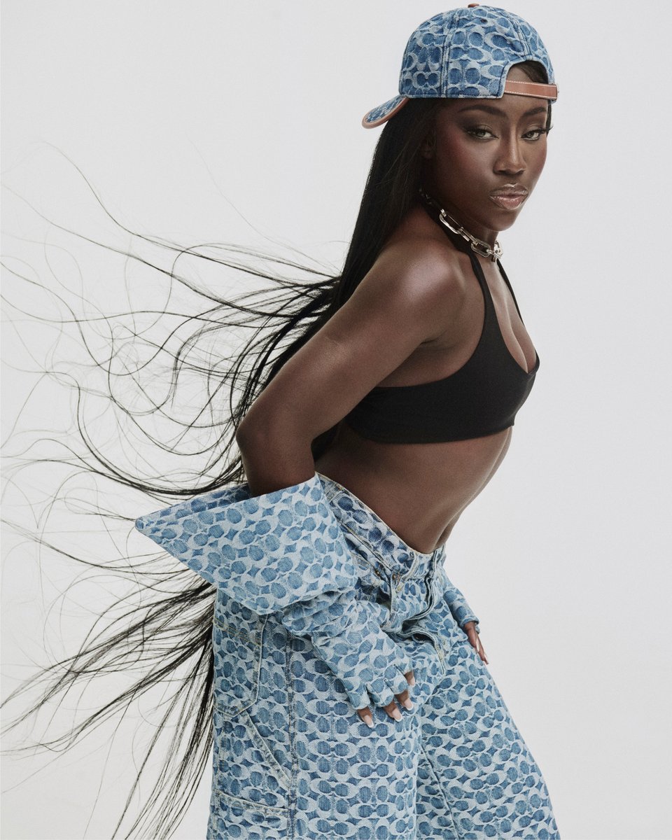 Coach's tweet photo. Jean dream. ✨ Singer-songwriter #BreeRunway covers the latest issue of @dazed in ice blue #CoachSignature. Our take on the full fit? Hot hot. #CoachNY https://t.co/RU7HljsfJX