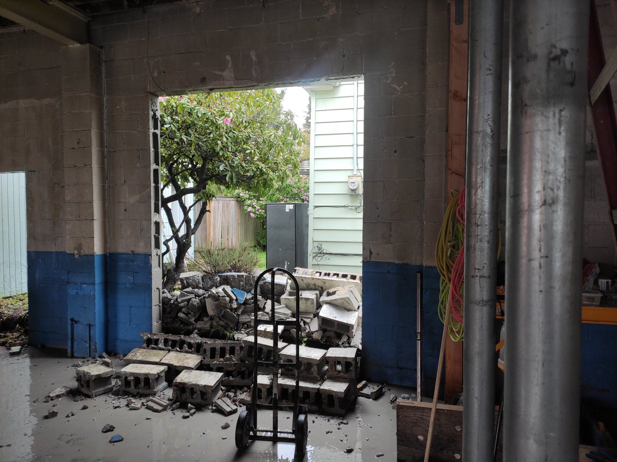 Kool-Aid man wall burst? Run away forklift? Nope. Nothing screams madness like purposefully busting a giant hole in a wall.