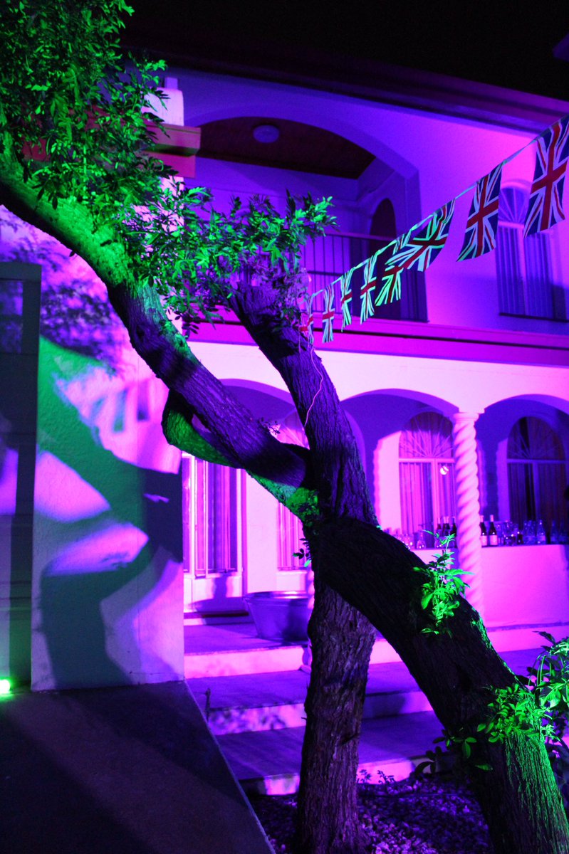 UKinNamibia's tweet photo. This time last week we lit up the residence PURPLE and GREEN and had ourselves a party! #ThrowbackThursday #HM70 #PlatinumJubilee #UKinNamibia https://t.co/P1MMtaf5ZG