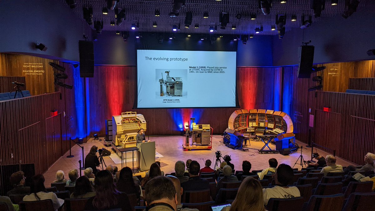 CommTechCurator's tweet image. James Mooney speaking at @nmc_canada on the tape recorder as electronic musical instrument. Note the instrument on centre stage: Hugh Le Caine&apos;s Special Purpose Tape Recorder (made in Ottawa, 1959). One of my fav artifacts at @IngeniumCa (on loan/exhibit at NMC). 🙌