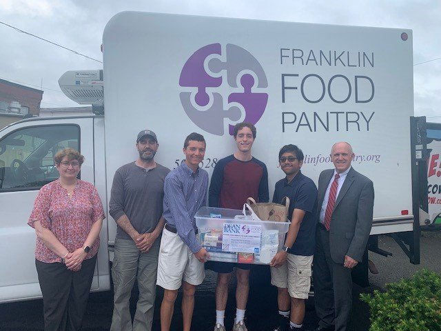 DeanBankMA's tweet photo. 3 Cheers to our @FranklinMA_DECA students  Max, Drew and Sameen on the completion of their community project.  They organized a food drive benefitting the @FranklinFoodPan.  Proceeds delivered along with a $500 check from the bank.  Great work gentlemen...we are proud of you! https://t.co/nhTCgakbSJ