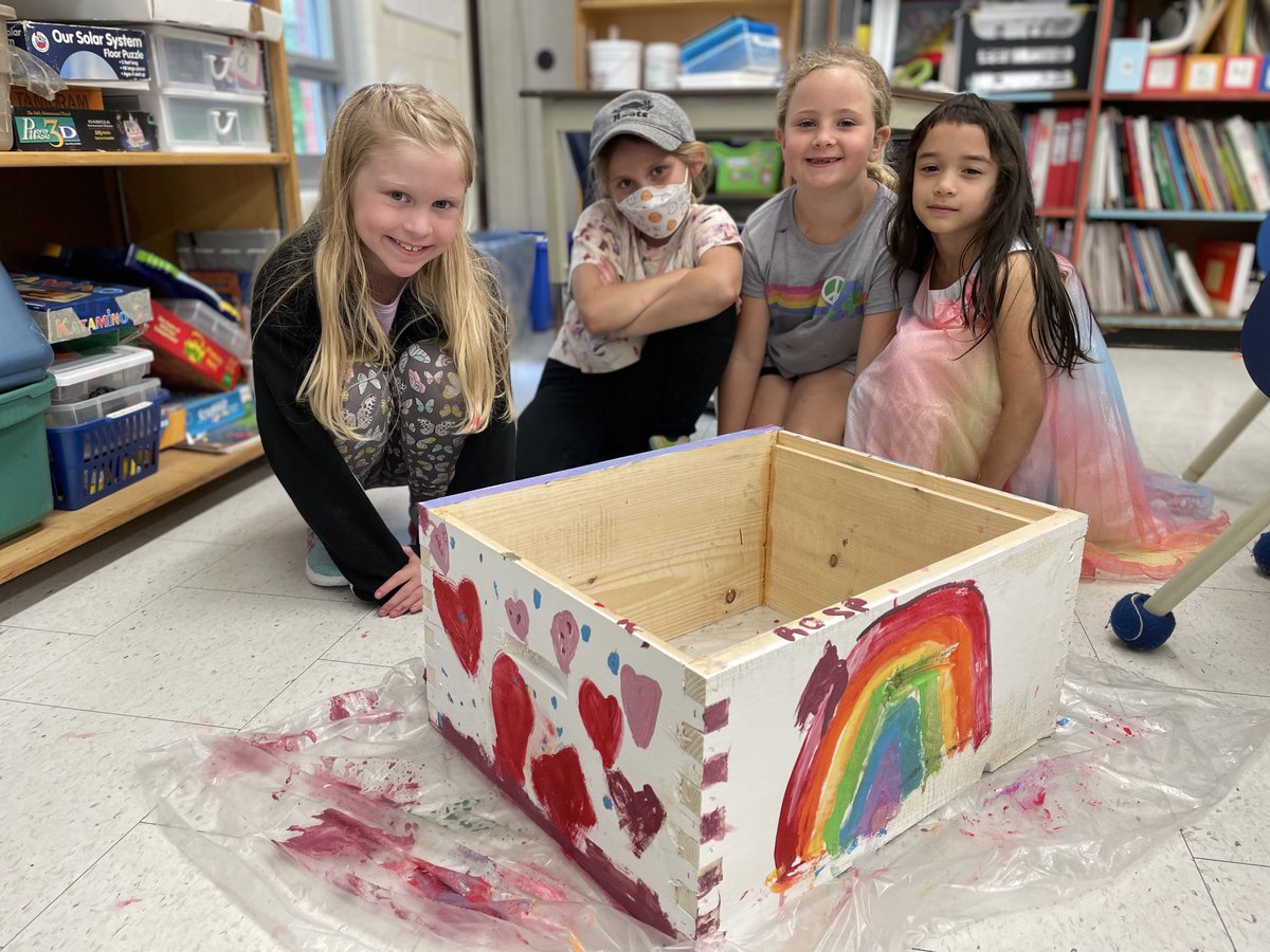 Painting bee boxes for a local farm bee-cause that’s what community does!