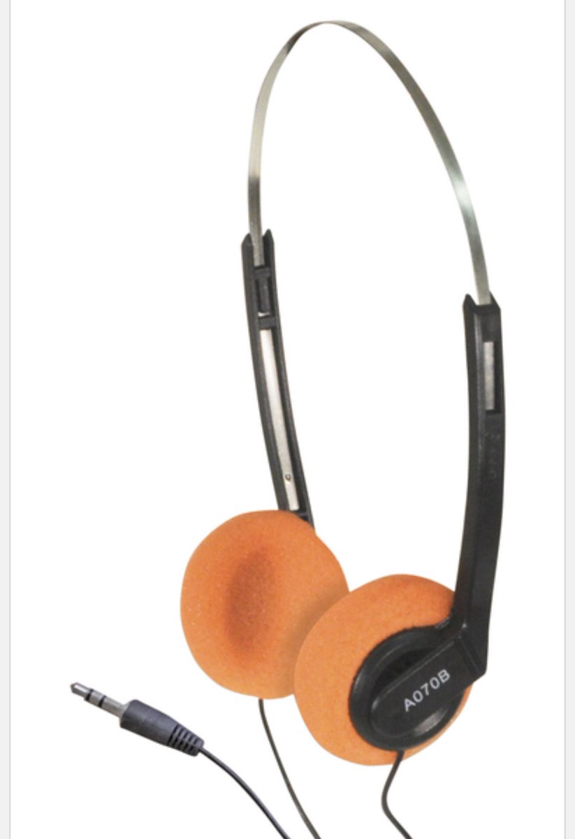 Boseman, Montana, middle of a family road trip. On my discman using these sweet headphones