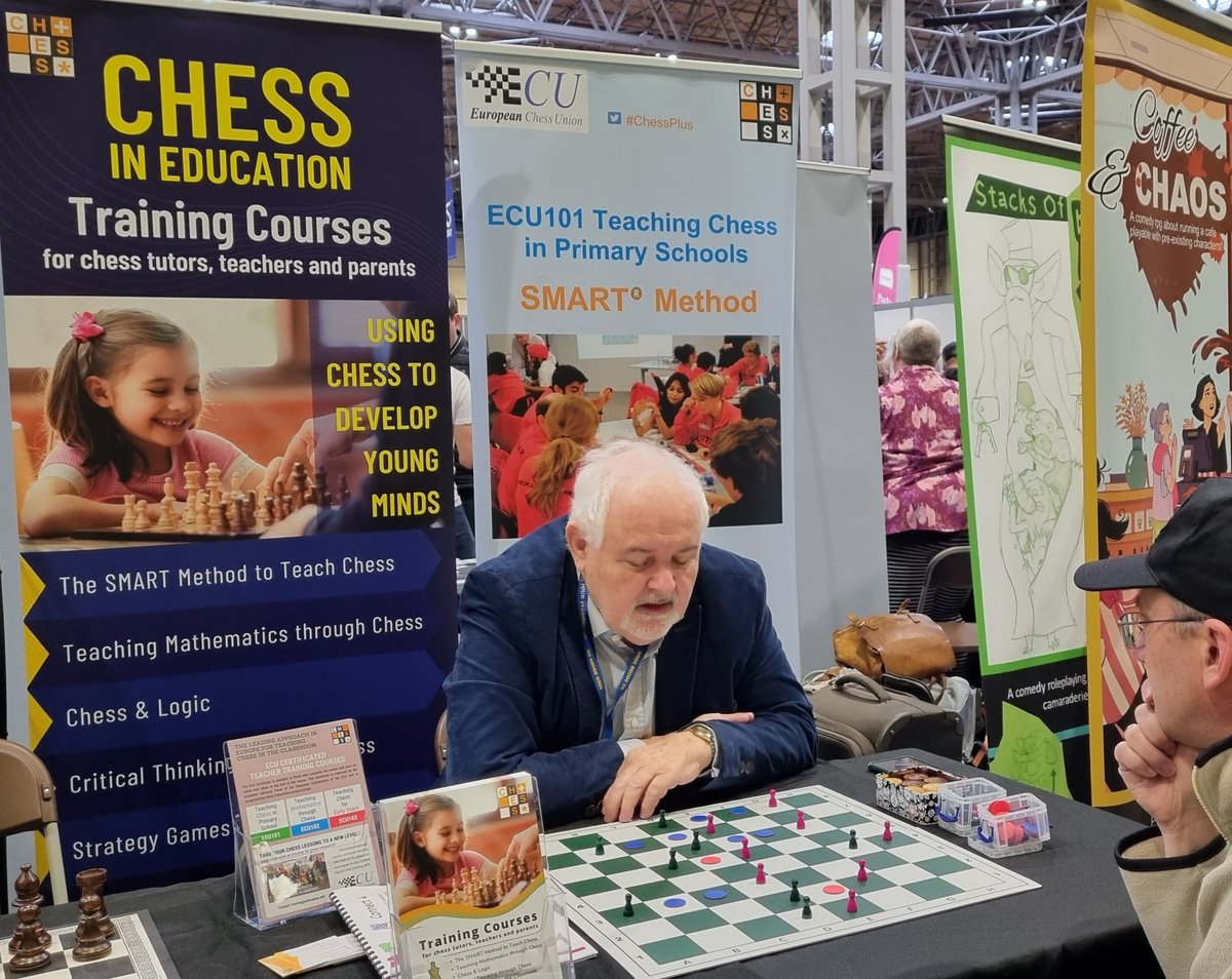 ChessPlus's tweet photo. @UKGamesExpo This is @ChessScholar demonstrating how to play #Halma on chessboard. We met many #educators. We also played #Nim or solved #MathsProblems on chessboard. And who knew #Vikings were into #Chess? #ukge2022 #chessplus https://t.co/Nc8ehuJ0kO