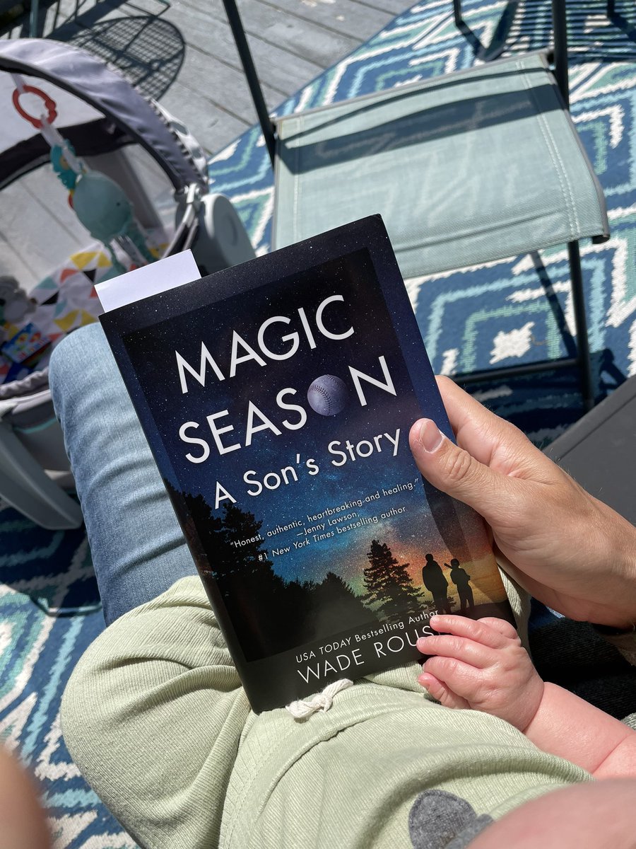 Enjoying the sun with my little dude and getting an early start to my summer reading with @waderouse book Magic Season.