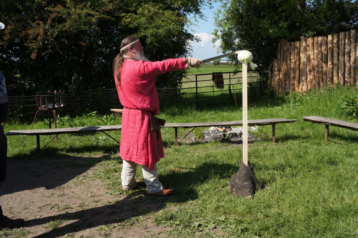 JudithJesch's tweet photo. We then proceeded to #MoorForge where @eblueaxe gave us some background (and glimpses of his treasure chest) and @ScienceViking66 instructed us in how to kill a cabbage with both sword and axe. https://t.co/O3hJ6a7cMt